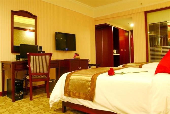 Vienna Hotel Chaoyang Nanning Rum bild