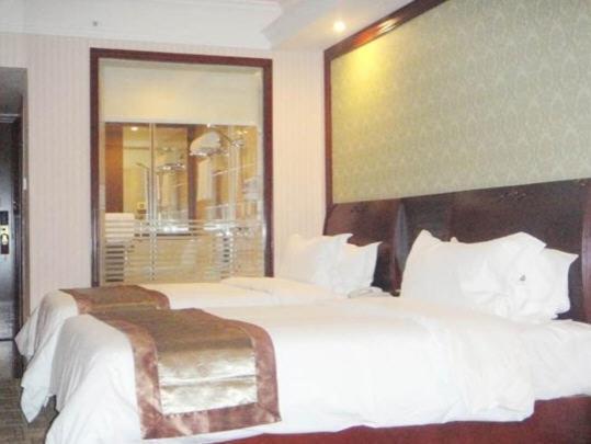 Vienna Hotel Chaoyang Nanning Rum bild